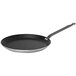 A black and silver de Buyer Choc crepe pan.