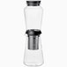 A clear glass Hario cold brew coffee maker with a black lid.