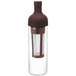 A brown glass bottle with a brown cap.