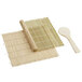 A bamboo sushi mat with a bamboo rice paddle.