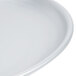 An American Metalcraft aluminum seafood tray with a rim on a white surface.