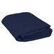 A folded navy blue Intedge table cover on a white background.