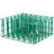 A Microwire green catering glassware basket with 36 compartments holding two wine glasses.