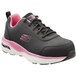 A black Skechers athletic shoe with pink accents and an alloy toe.