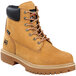 A pair of Timberland PRO wheat leather work boots with black laces and a black sole.