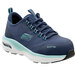 A close up of a navy blue and aqua Skechers Work Sadie athletic shoe with an alloy toe.