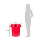 A woman standing next to a red Rubbermaid BRUTE trash can.
