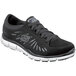 A black Skechers Work Stacey athletic shoe with white soles.