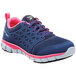 A close up of a navy and pink Reebok Sublite women's athletic shoe.