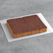 A Best Maid Peanut Butter Crispy Treat half sheet cut into squares with chocolate on top.