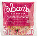 A close-up of a pink Eban's Bakehouse bag of gluten-free coconut cranberry walnut oatmeal cookies.