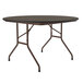 A Correll round walnut folding table with metal legs.