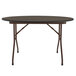 A Correll round folding table with a walnut top and metal legs.