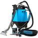 A blue and black Mytee 2008CS carpet extractor with a hose and a canister.
