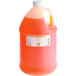 A jug of orange liquid labeled "LorAnn Oils Mango Super Strength Flavor"