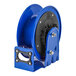 A blue Coxreels compact power cord reel with black accents.