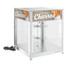 A ServIt countertop display warmer with rotating racks inside a glass box.