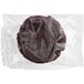 An individually wrapped Southern Roots vegan double chocolate chip cookie in a clear plastic bag.