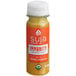 A close up of a Suja Immunity Defense Wellness Cold-Pressed Juice Shot bottle.