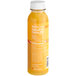 A close up of a bottle of Suja Citrus Immunity Cold-Pressed Juice with a label on it.
