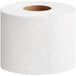 A roll of Tork Universal toilet paper on a white background.