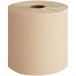 A roll of Tork natural kraft paper towels.