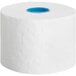 A white roll of Tork Advanced 2-ply toilet paper with blue trim.