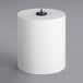 A white roll of Tork Universal Matic paper towels.