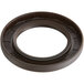 A brown rubber oil seal with a metal ring.