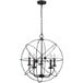 A black wire Canarm chandelier with five lights in a restaurant dining area.