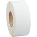 A roll of white labels on white paper.
