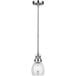 A Canarm Carson brushed nickel pendant light with a clear glass shade over a silver metal base.
