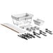 A Choice 60 piece disposable chafing dish kit with utensils on a table outdoors.