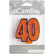 A package of an orange birthday candle with the number 40 in glitter.