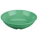 A rainforest green bowl with a white background.