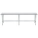 A long metal Advance Tabco stainless steel work table with an open base.