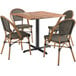 A Lancaster Table & Seating Excalibur Yukon Oak table with 4 brown chairs on an outdoor patio.