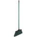 A Lavex green broom with a long metal handle.