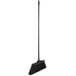 A Lavex black angled broom with a long silver metal handle.