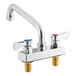A silver chrome Regency deck-mounted faucet with two knobs.