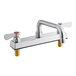 A silver Regency deck-mounted faucet with two handles, one red and one blue.