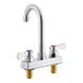 A chrome Regency deck-mounted faucet with two silver knobs.