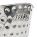 A close up of a silver Tablecraft Bali oval beverage tub with holes in it.