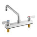 A silver Regency deck-mounted faucet with two knobs.