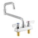 A chrome Regency deck-mounted faucet with double-jointed swing spout and two handles.