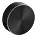A black circular knob with a circular pattern on a white background.