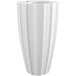 A white planter with a curved bottom and vertical lines.