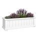 A white rectangular Mayne Cape Cod window box with purple flowers.