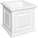 A white square planter box with a square base.