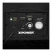 An XPOWER portable air scrubber with the power switch on.